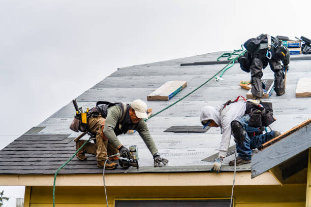 Professional Gutter Installation technician working in Randolph, MA